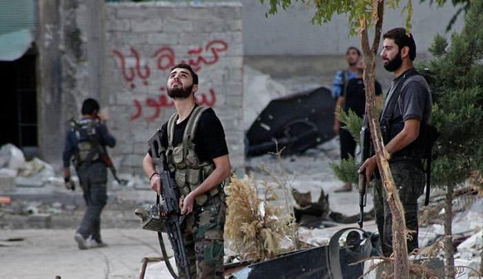 На стороне сирийских повстанцев воюет целый отряд крымчан.