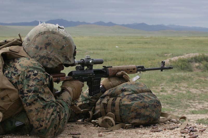 U.S. Marines fire a Dragunov SVD sniper rifle provided by the Mongolian armed forces as part of Khaan Quest 2009 at the Five Hills Training Area in Mongolia Aug. 14, 2009. The Marines and Mongolians are exchanging knowledge about their respective weapon systems. (U.S. Marine Corps photo by Lance Cpl. Nathan McCord/Released) 