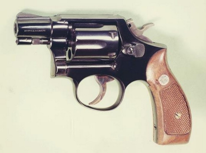 Револьвер калибра .38.