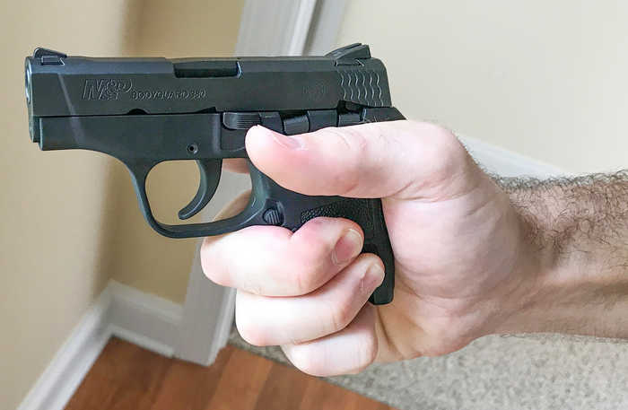 How to hold a small pistol with large hands 