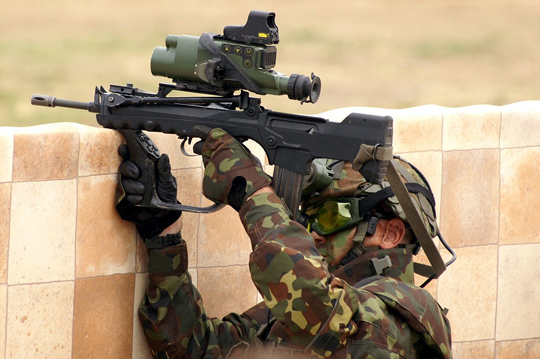 Felin equipped FAMAS rifle in action. Works just as well in the dark.