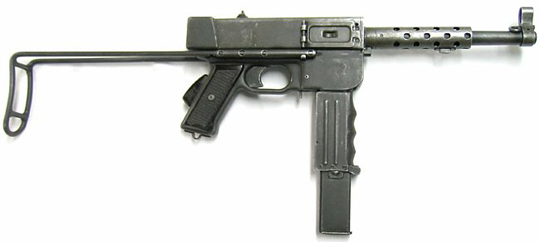 With the magazine removed, the magazine well can be rotated forward for storage.