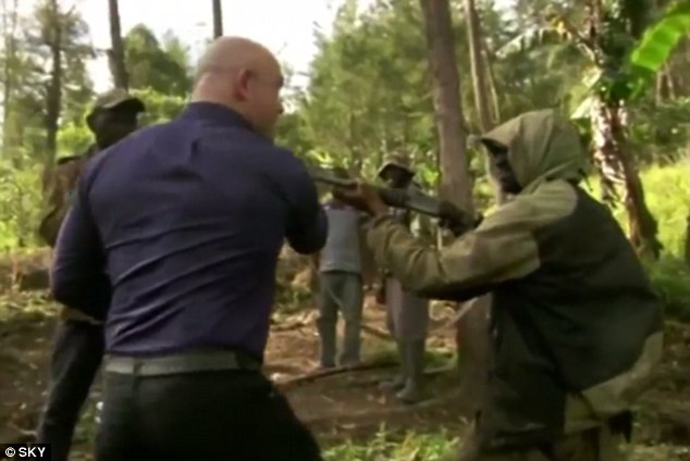 'You're not going to f****** kill me!': Ross Kemp stares down guerrillas in the highlands of Papua New Guinea