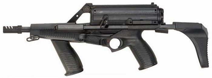 Пистолет-пулемет Calico M960 калибра 9 мм с магазином конструкции Майкла Миллера и Уоррена Стоктона емкостью 50 патронов, и сложенным телескопическим прикладом