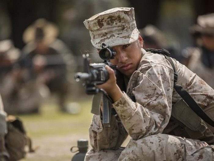 A Marine recruit practices the sitting position during marksmanship training at Marine Corps Recruit Depot Parris Island, S.C.