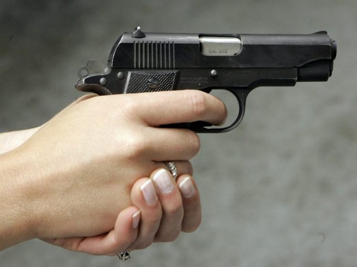 woman handgun