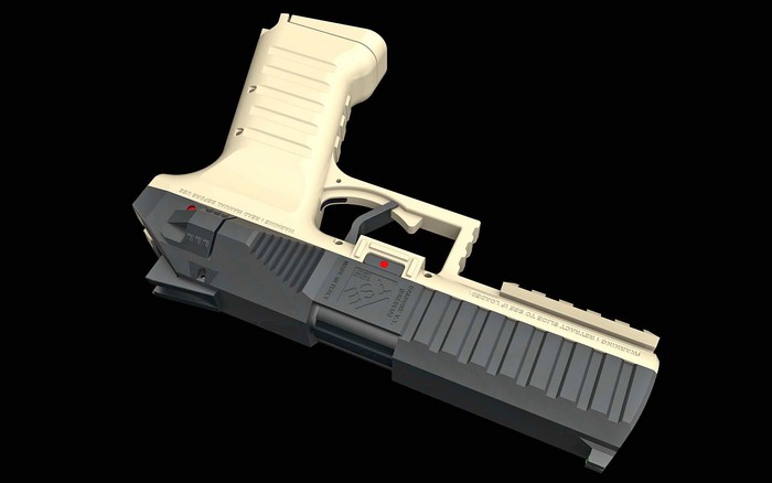 Symmetrical – пістолет з курковим УСМ.
