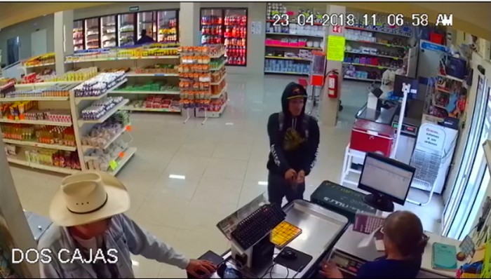 Customer wrestles gun from armed robber in Mexico