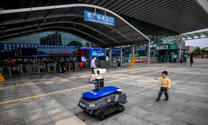 A police robot monitors compliance with anti-coronavirus rules in Shenzhen, China.