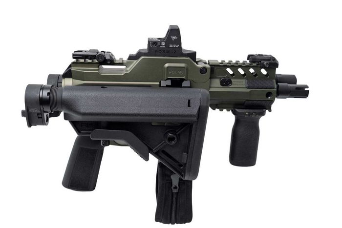 Права сторона Freedom Ordnance FM-9 із прикладом, відкинутим убік.